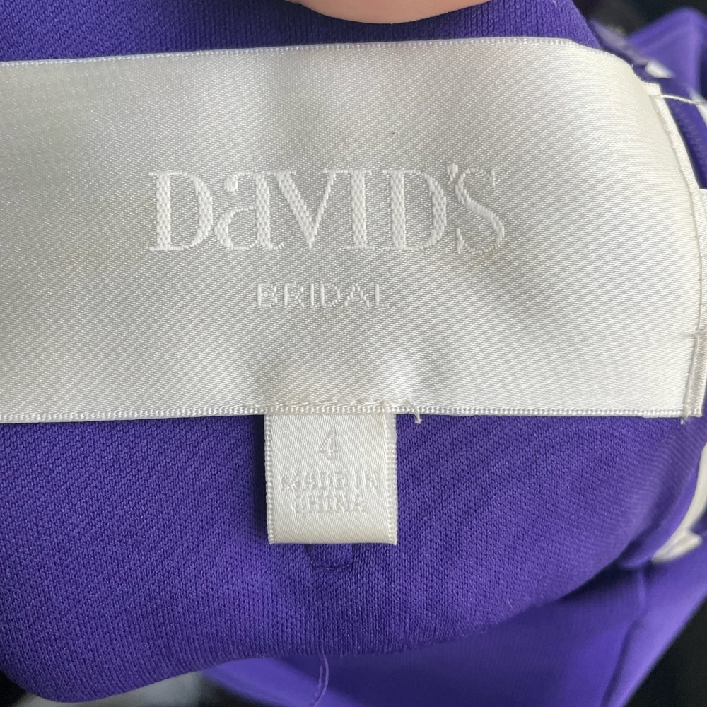 David’s bridal dress wore only one. New condition size 4